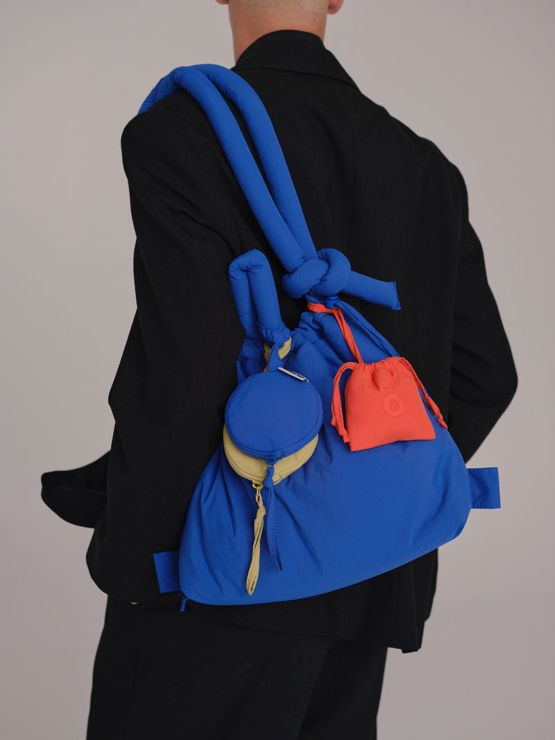 CIRCULAR MINI PURSE - CORAL