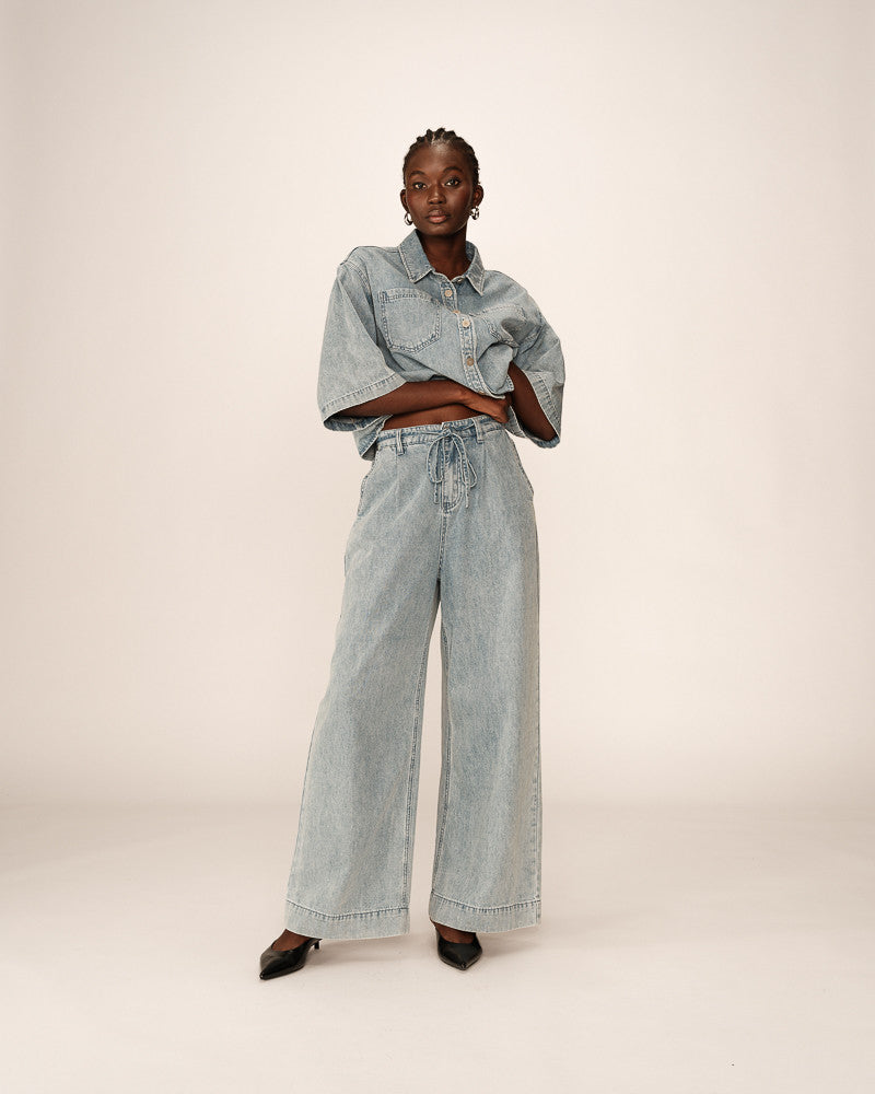 JEANS SKY BLUE POMPON