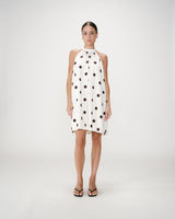 Sleeveless flared polka dot short dress ecru Warna