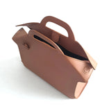 The Sleeveless Garden Ginyu leather handbag